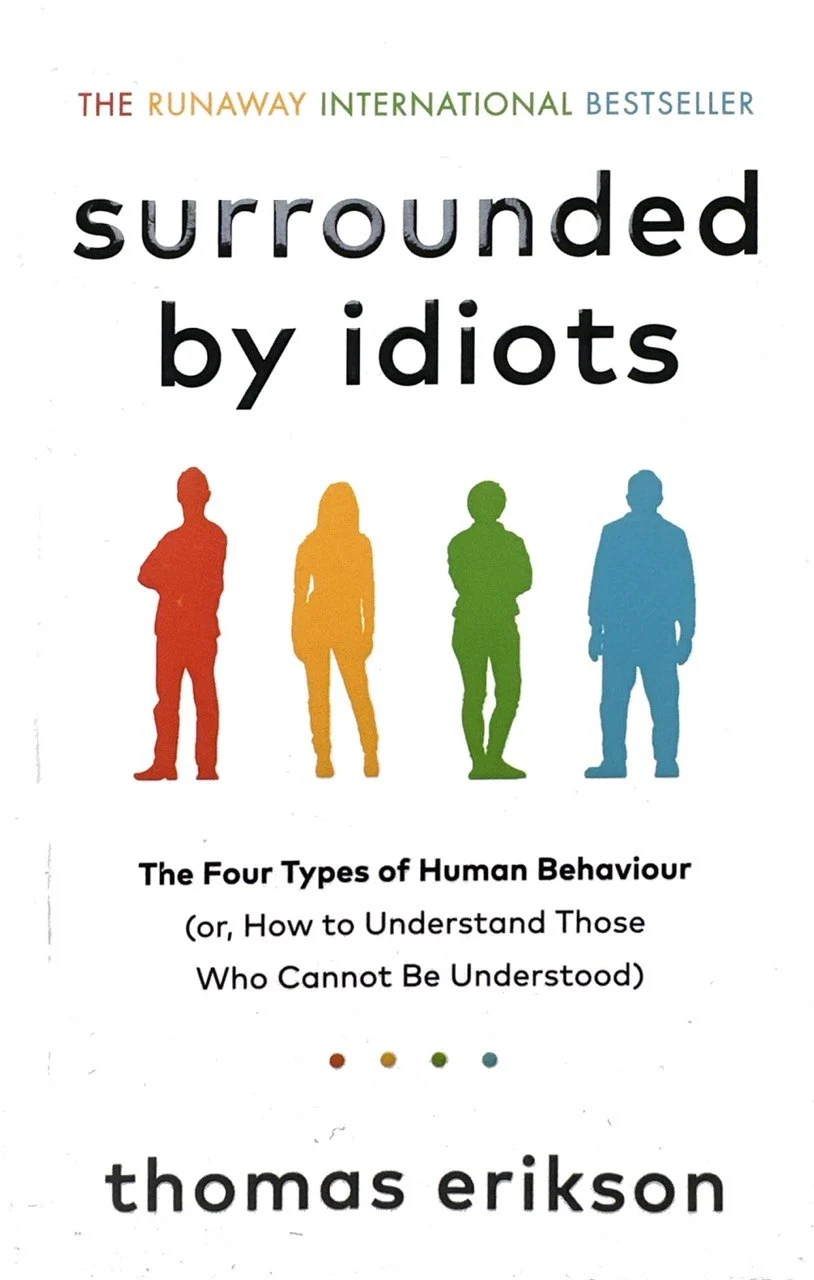جلد کتاب surrounded by idiots